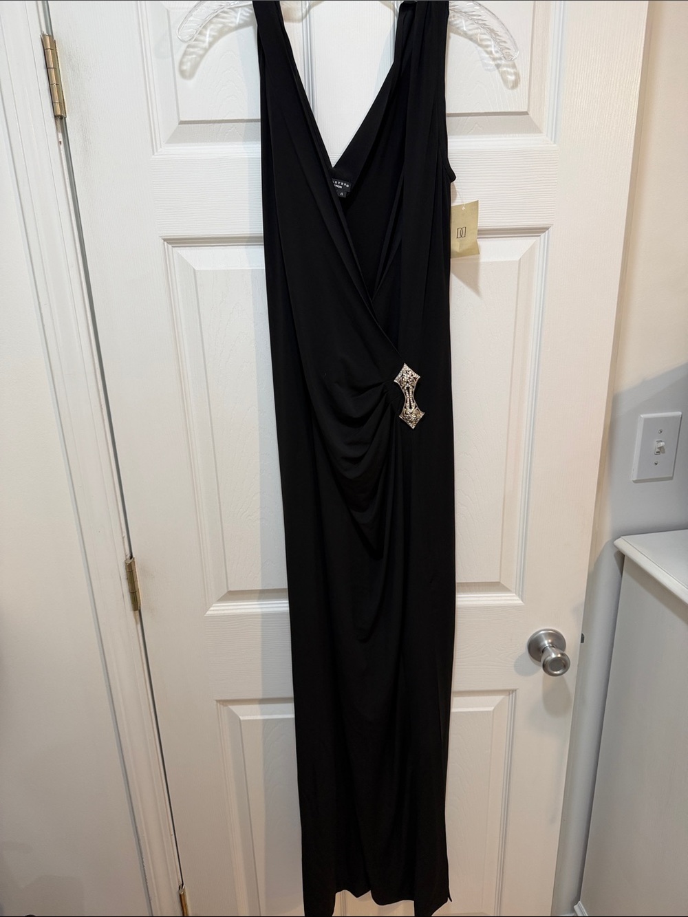Doncaster Black Sleeveless Draped Maxi Dress with Decorative Brooch